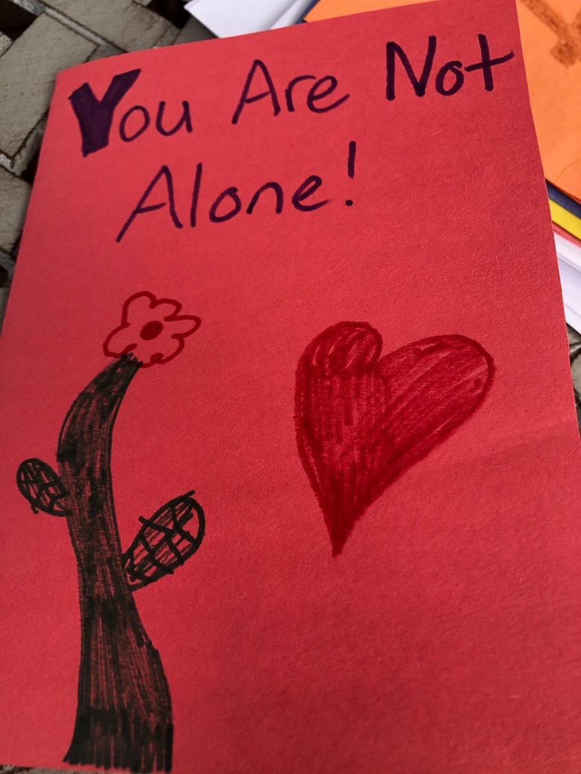Teens from St. John Vianney Church Youth Ministry send out cards and letters to more than 200 parishioners as a loving reminder that they are keeping them in prayer.